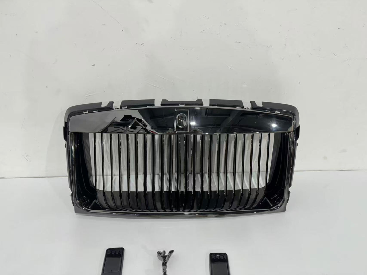 FRONT GRILLE for ROLLS ROYCE WRAITH 2013 - 2023

Set includes:

Grille

Material: Plastic&nbsp;


NOTE: Need to reuse OEM frame plastic bracket. Professional installation is required.&nbsp;