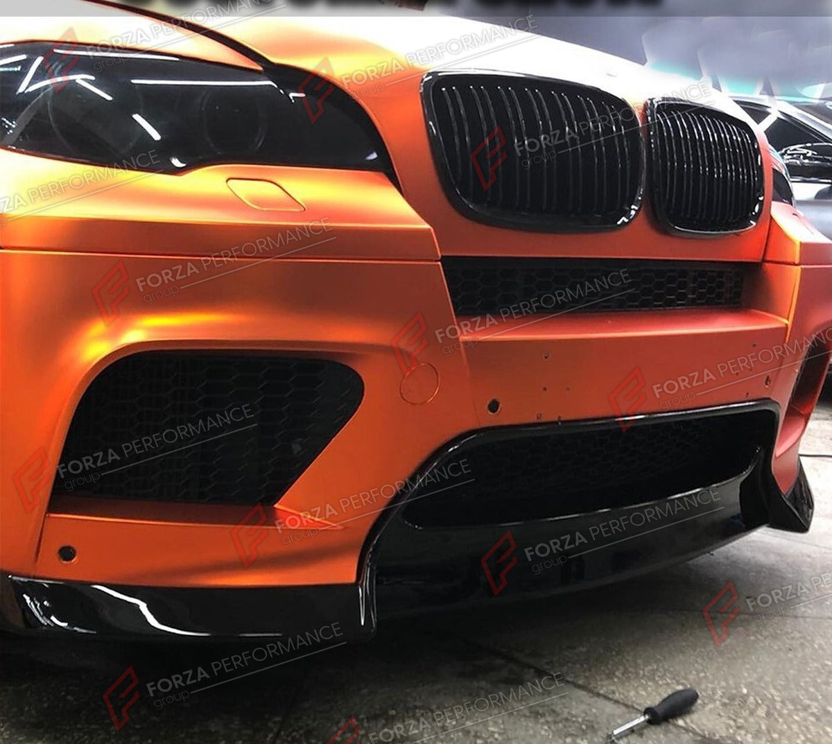 FRONT LIP for BMW X6M E71 X5M E70 2010 - 2014 FORZA PERFORMANCE Custom Fit
Set includes:

Front Lip
Material: Plastic

NOTE: Professional installation is required.

Why “Contact Us for Pricing”?
We don’t display fixed prices because our goal is to offer you the most competitive deal possible. Product costs often decrease over time, and by requesting a quote, you’ll receive our most up-to-date price on market.

SECURED PAYMENT METHODS
PayPal (+4.4% fee)
Visa / Mastercard / American Express (through PayPal)
B