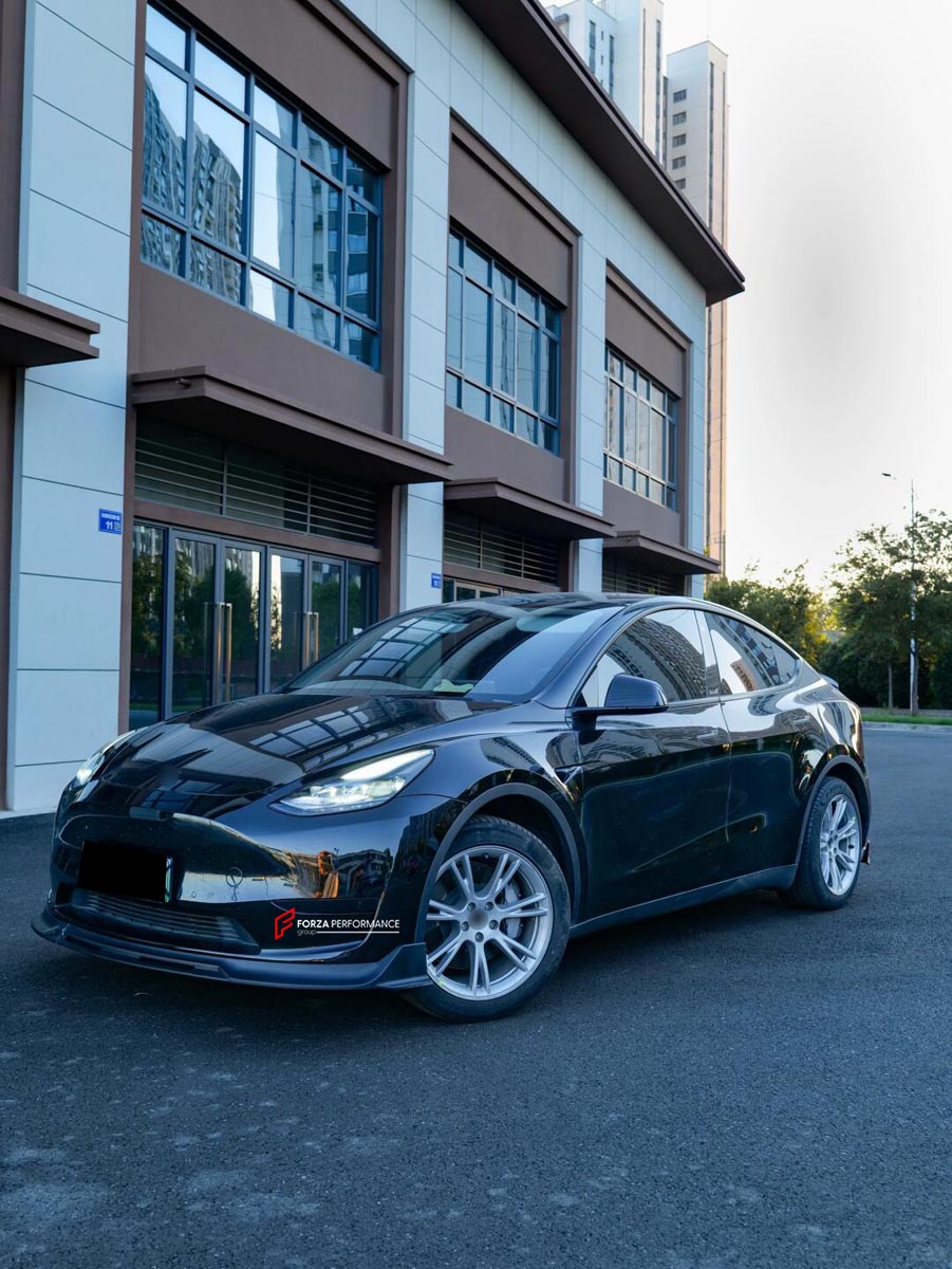 FRONT LIP REAR DIFFUSER REAR SPOILER for TESLA MODEL Y 2020 - 2024 FORZA PERFORMANCE Custom fit Dry Carbon VTEN Design Style
Set includes:

Front Lip
Rear Diffuser
Rear Spoiler
Material: Plastic

NOTE: Professional installation is required.