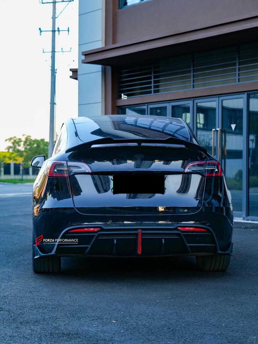 FRONT LIP REAR DIFFUSER REAR SPOILER for TESLA MODEL Y 2020 - 2024 FORZA PERFORMANCE Custom fit Dry Carbon VTEN Design Style
Set includes:

Front Lip
Rear Diffuser
Rear Spoiler
Material: Plastic

NOTE: Professional installation is required.