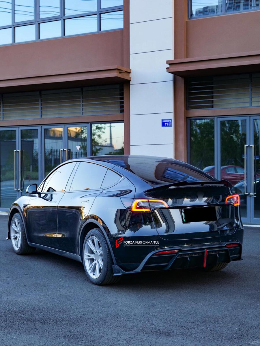 FRONT LIP REAR DIFFUSER REAR SPOILER for TESLA MODEL Y 2020 - 2024 FORZA PERFORMANCE Custom fit Dry Carbon VTEN Design Style
Set includes:

Front Lip
Rear Diffuser
Rear Spoiler
Material: Plastic

NOTE: Professional installation is required.