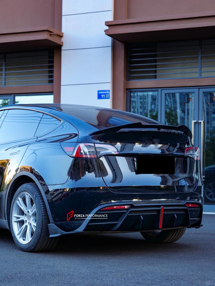 FRONT LIP REAR DIFFUSER REAR SPOILER for TESLA MODEL Y 2020 - 2024 FORZA PERFORMANCE Custom fit Dry Carbon VTEN Design Style
Set includes:

Front Lip
Rear Diffuser
Rear Spoiler
Material: Plastic

NOTE: Professional installation is required.
