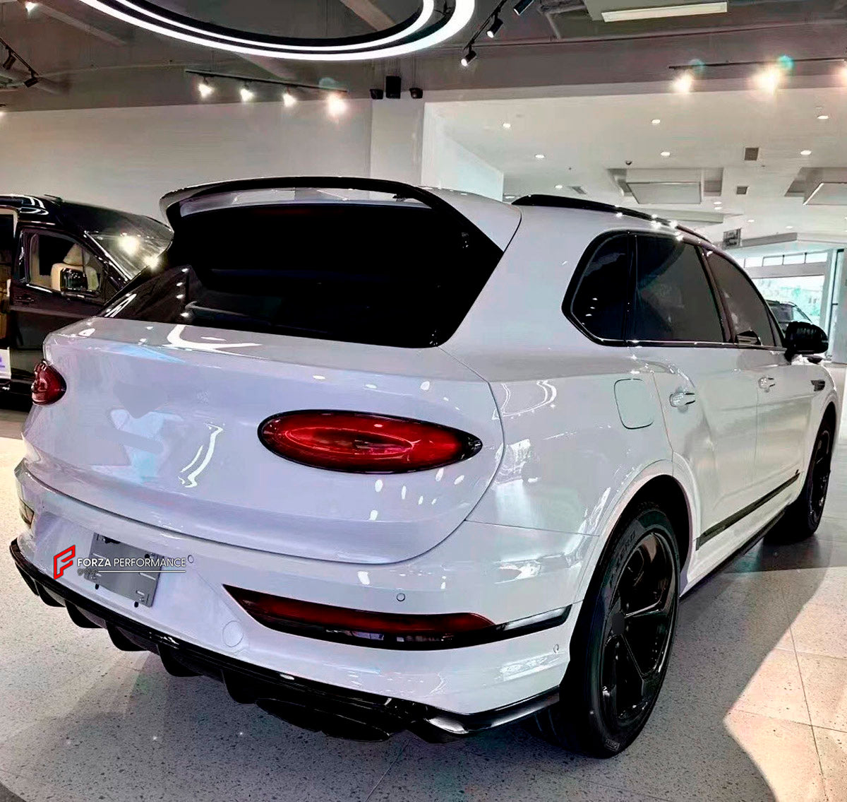CARBON BODY KIT for BENTLEY BENTAYGA FACELIFT 2020+

Set includes:

Front Lip
Side Skirts
Roof Spoiler
Rear Diffuser
Material: Dry Carbon + Plastic

Note: Professional installation is required.