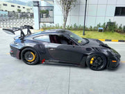 FULL CARBON SHELL REPLACEMENT PARTS for PORSCHE 911 992.1 GT3 RS 2019 - 2025
Set includes:

Front Lip
Front Bumper
Hood Bonnet
Front Fenders
Side Skirts
Doors
Quarter Panel
Engine Lid
Rear Duck Spoiler
Rear Bumper
Rear Diffuser
Rear Wing Spoiler
Material: Dry Carbon

NOTE: Professional installation is required.