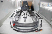 FULL CARBON SHELL REPLACEMENT PARTS for PORSCHE 911 992.1 GT3 RS 2019 - 2025
Set includes:

Front Lip
Front Bumper
Hood Bonnet
Front Fenders
Side Skirts
Doors
Quarter Panel
Engine Lid
Rear Duck Spoiler
Rear Bumper
Rear Diffuser
Rear Wing Spoiler
Material: Dry Carbon

NOTE: Professional installation is required.