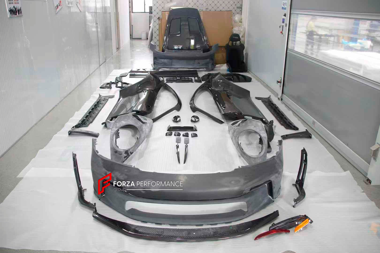 FULL CARBON SHELL REPLACEMENT PARTS for PORSCHE 911 992.1 GT3 RS 2019 - 2025
Set includes:

Front Lip
Front Bumper
Hood Bonnet
Front Fenders
Side Skirts
Doors
Quarter Panel
Engine Lid
Rear Duck Spoiler
Rear Bumper
Rear Diffuser
Rear Wing Spoiler
Material: Dry Carbon

NOTE: Professional installation is required.