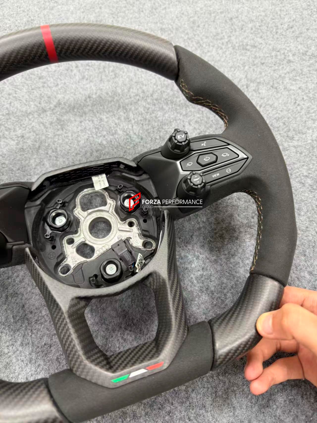 GENUINE LAMBORGHINI CARBON ALCANTARA STEERING WHEEL for LAMBORGHINI REVUELTO 2023+

Set includes:

Steering wheel

Condition: New

Material: Carbon, Alcantara