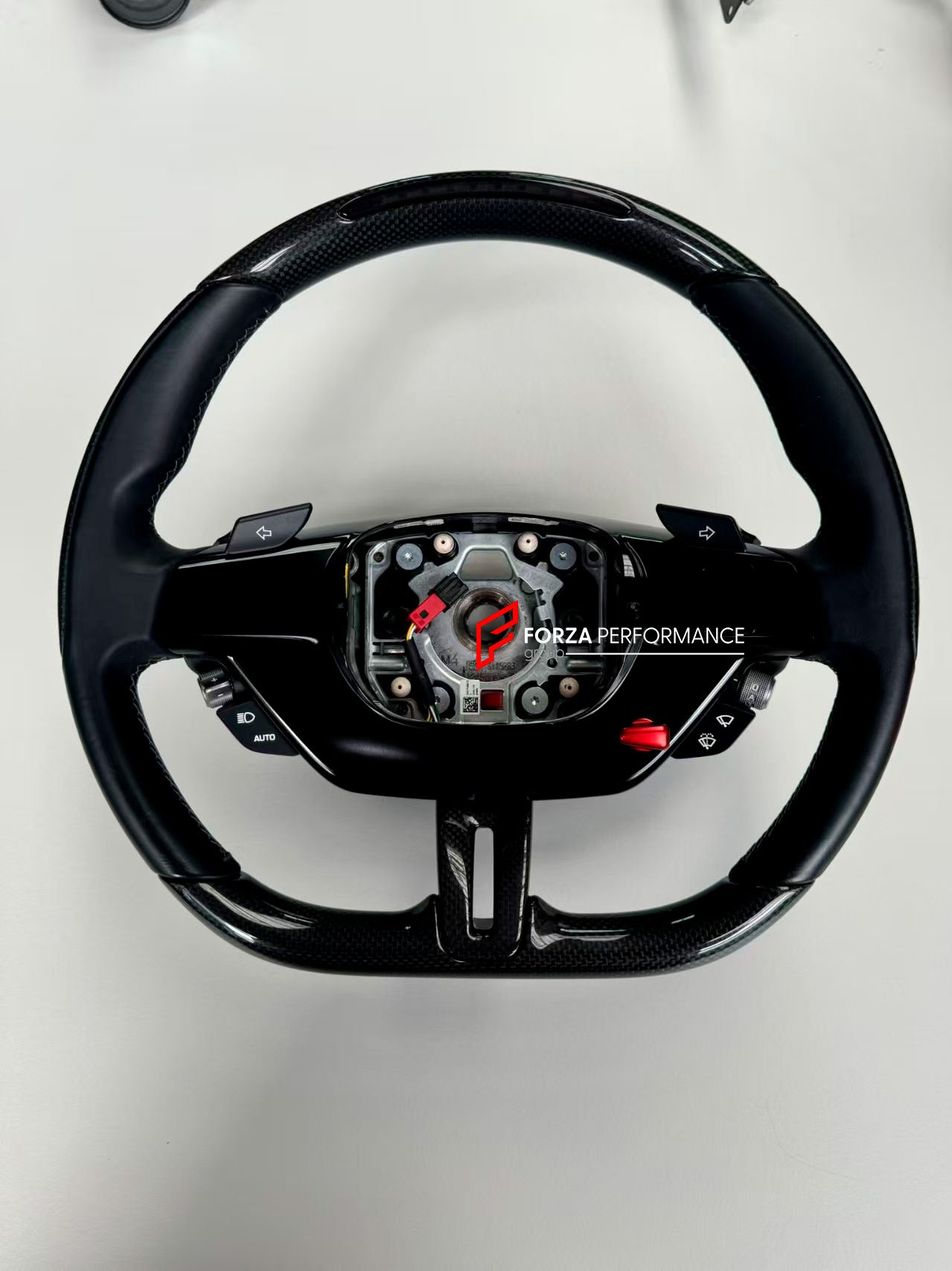 GENUINE OEM FERRARI COMPLETE STEERING WHEEL for FERRARI SF90 296

Set includes:


Steering Wheel


Part number: 910847, 910849, 910848, 922803, 922804.

NOTE: Professional installation is required