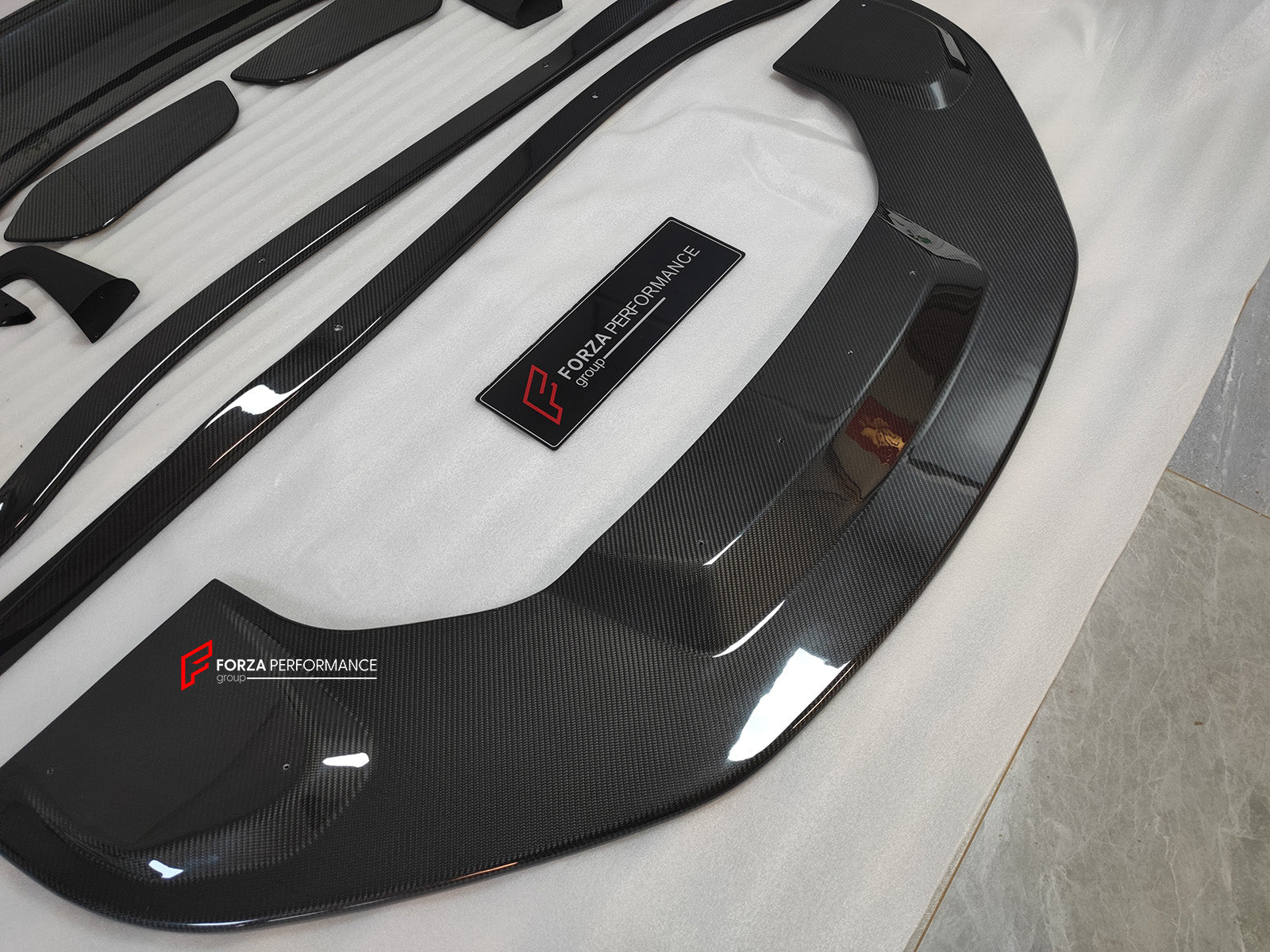GT4 STYLE CARBON BODY KIT for LOTUS EMIRA

Set includes:

Front Lip
Side Skirts
Rear Spoiler

Material: Carbon

Note: Professional installation is required.

CONTACT US FOR PRICING
