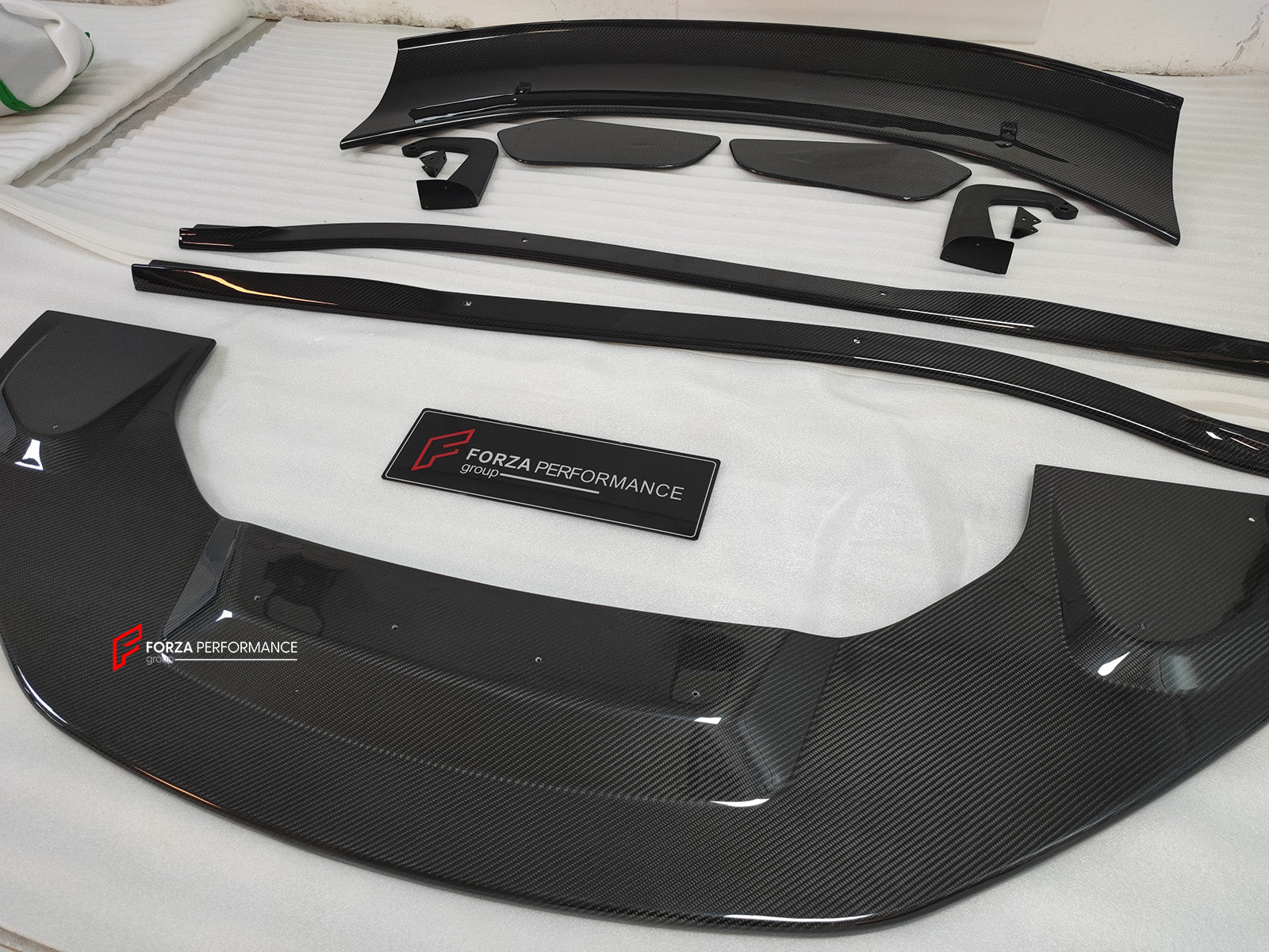 GT4 STYLE CARBON BODY KIT for LOTUS EMIRA

Set includes:

Front Lip
Side Skirts
Rear Spoiler

Material: Carbon

Note: Professional installation is required.

CONTACT US FOR PRICING