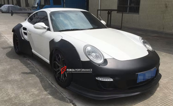 WIDE BODY KIT for PORSCHE 911 997.2 2008 - 2013

Set includes:

Front Lip
Front Bumper

Fender Flares
Side skirts
Rear Spoiler
Rear Bumper

Material: Fiberglass

NOTE: Professional installation is required