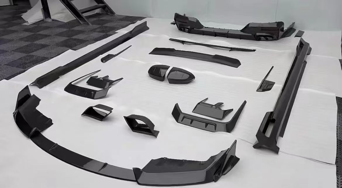 DRY CARBON BODY KIT for BMW 7 SERIES G70 2022+

Set includes:

Front Lip
Front Bumper Trims
Front Bumper Air Vent Covers
Side Mirror Covers
Side Trims
Side Skirts
Roof Spoiler
Rear Spoiler
Rear Diffuser

Material: Dry Carbon

Note: Professional installation is required.

Contact us for pricing

Payment ►
Visa
Mastercard
PayPal with a credit card (add 4.4% at checkout)
Payoneer
Cryptocurrency
Shipment ►
By express DHL/UPS/TNT/FedEx
To the local international airport
Special line by air
Special line by the se