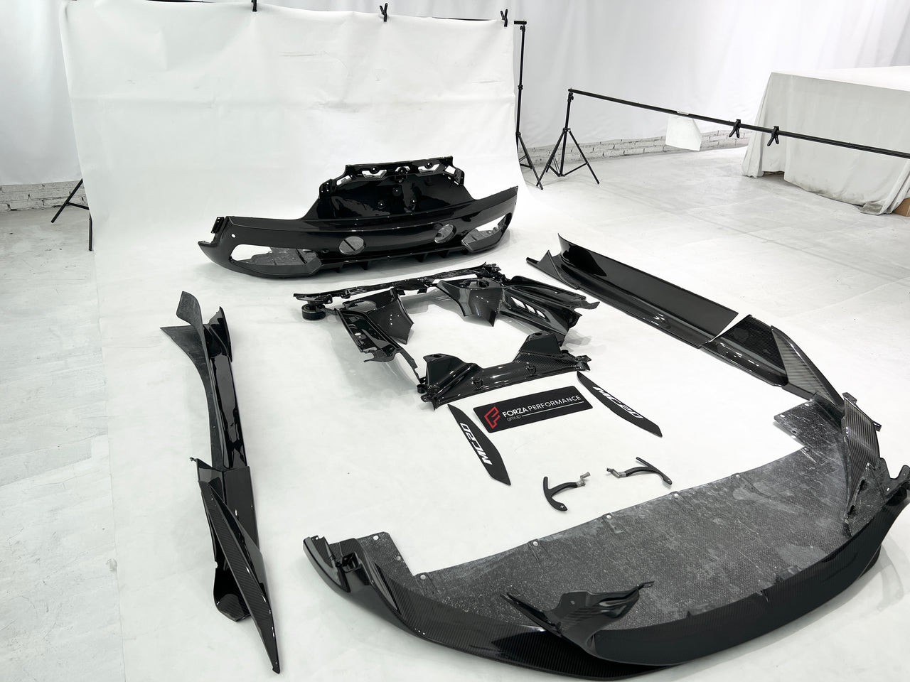 OEM STYLE DRY CARBON BODY KIT for MASERATI MC20 2020+  Set includes: Front Lip Side Skirts Rear Diffuser Rear Vent Trims Side Mirror Covers Shift Paddles Center Dashboard Cover Door Sills Engine Cover