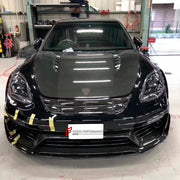 CARBON WIDE BODY KIT for PORSCHE PANAMERA 971.1 2017 - 2020

Set includes:

Front Bumper
Front Canards
Hood Bonnet
Side Mirror Covers
Side Skirts
Side Fenders with Vents
Rear Canards
Rear Spoiler
Rear Diffuser
Material: Carbon

NOTE: Professional installation is required. Factory LED DRL must be reused.