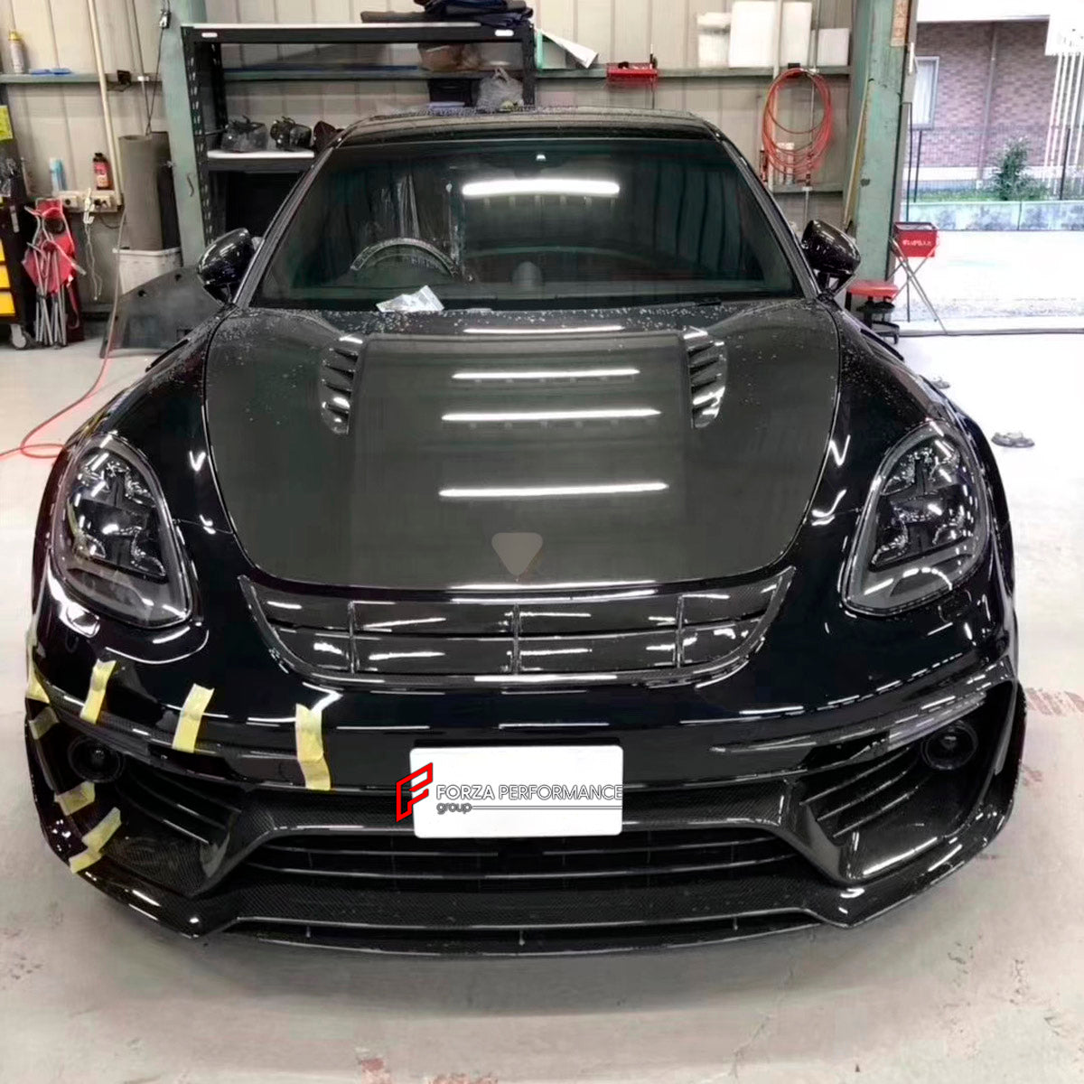CARBON WIDE BODY KIT for PORSCHE PANAMERA 971.1 2017 - 2020

Set includes:

Front Bumper
Front Canards
Hood Bonnet
Side Mirror Covers
Side Skirts
Side Fenders with Vents
Rear Canards
Rear Spoiler
Rear Diffuser
Material: Carbon

NOTE: Professional installation is required. Factory LED DRL must be reused.