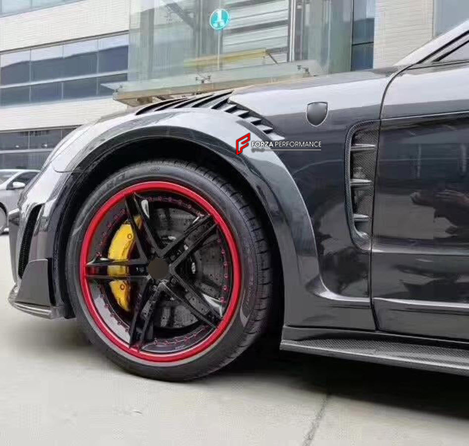 CARBON WIDE BODY KIT for PORSCHE PANAMERA 971.1 2017 - 2020

Set includes:

Front Bumper
Front Canards
Hood Bonnet
Side Mirror Covers
Side Skirts
Side Fenders with Vents
Rear Canards
Rear Spoiler
Rear Diffuser
Material: Carbon

NOTE: Professional installation is required. Factory LED DRL must be reused.