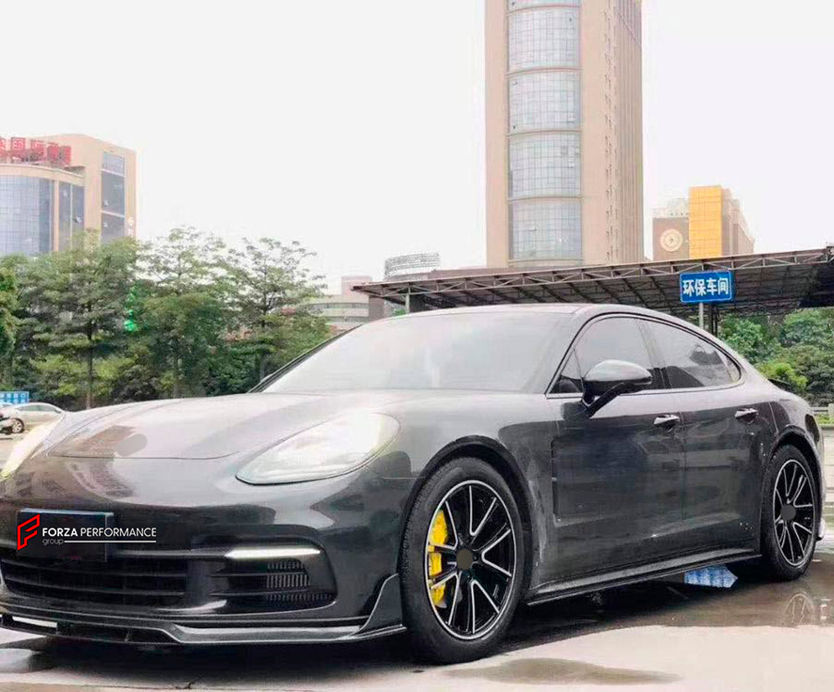 CARBON WIDE BODY KIT for PORSCHE PANAMERA 971.1 2017 - 2020

Set includes:

Front Bumper
Front Canards
Hood Bonnet
Side Mirror Covers
Side Skirts
Side Fenders with Vents
Rear Canards
Rear Spoiler
Rear Diffuser
Material: Carbon

NOTE: Professional installation is required. Factory LED DRL must be reused.