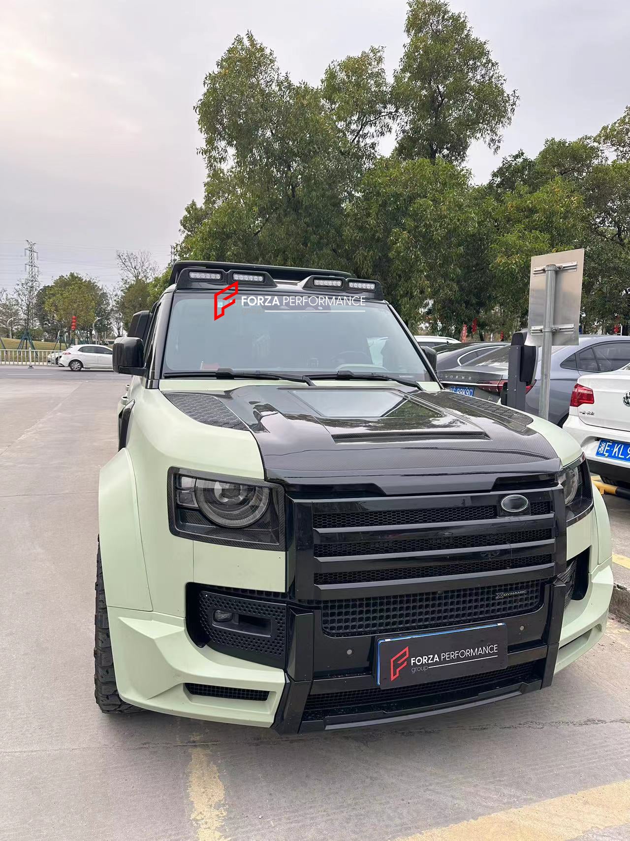 WIDE BODY KIT for LAND ROVER DEFENDER 2021+  Set includes:  Front Bumper Rear Bumper Side Fenders Side Skirts Front Grille Roof LED Bar Dry Carbon Hood with Glass Roof Spoiler Side Skirts