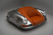The 911 901 Sofa is inspired by the 1965 Porsche 911 901, This two-seater sofa retains the classic lines of the iconic model, seamlessly blends classic and modern elements, exuding a unique charm.

Features:

Customize the color of sofa body and leather
Ambient Lighting with Functional Turn Signals lamp; Headlights
1600x1800x1100mm