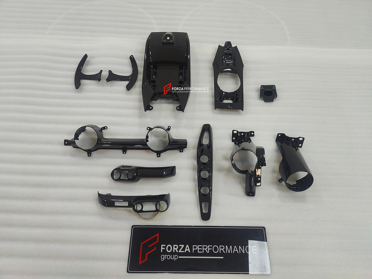 OEM DRY CARBON INTERIOR PARTS for FERRARI 812 SUPERFAST | GTS 2017 +
Set includes:
Dashboard Trims
Shift Paddles
Centre Console Box
Material: Dry Carbon
Note: Professional installation is required.
Contact us for pricing.