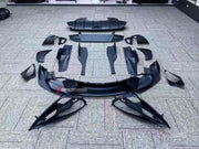 OEM Style Dry Carbon Body Kit For McLaren 720S  Set Include:  Upper Engine Cover Lower Engine Cover Headlight Brackets Front Hood Air Inlet Front Bumper Air Inlet Front Lip Aero Bridge Door Handle Trims Mirror Covers Rear Fender Air Inlet Rear Bumper Rear Diffuser Front Hood Material: Dry carbon  NOTE: Professional installation is required