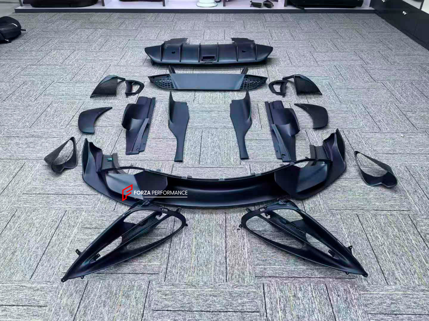 OEM Style Dry Carbon Body Kit For McLaren 720S  Set Include:  Upper Engine Cover Lower Engine Cover Headlight Brackets Front Hood Air Inlet Front Bumper Air Inlet Front Lip Aero Bridge Door Handle Trims Mirror Covers Rear Fender Air Inlet Rear Bumper Rear Diffuser Front Hood Material: Dry carbon  NOTE: Professional installation is required