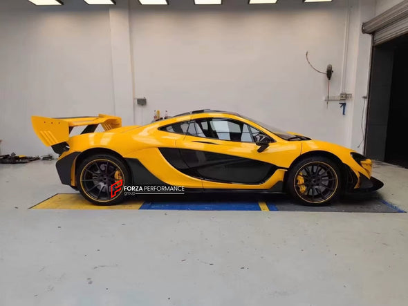 CONVERSION UPGRADE DRY CARBON BODY KIT for MCLAREN 650S 2014 - 2017 upgrade to P1

Set includes:

Front Lip
Front Bumper Body Panel
Side Skirts
Rear Quarter Body Panel
Engine Cover Panel
Rear Spoiler
Rear Bumper
Rear Diffuser
Exhaust System

Material: Dry Carbon

NOTE: Professional installation is required.