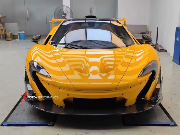 CONVERSION UPGRADE DRY CARBON BODY KIT for MCLAREN 650S 2014 - 2017 upgrade to P1

Set includes:

Front Lip
Front Bumper Body Panel
Side Skirts
Rear Quarter Body Panel
Engine Cover Panel
Rear Spoiler
Rear Bumper
Rear Diffuser
Exhaust System

Material: Dry Carbon

NOTE: Professional installation is required.
