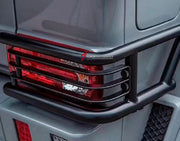 REAR LIGHT COVERS for MERCEDES-BENZ G-CLASS W463 2008 - 2018

Set includes:
Rear Light Covers

Material: Plastic

NOTE: Professional installation is required.