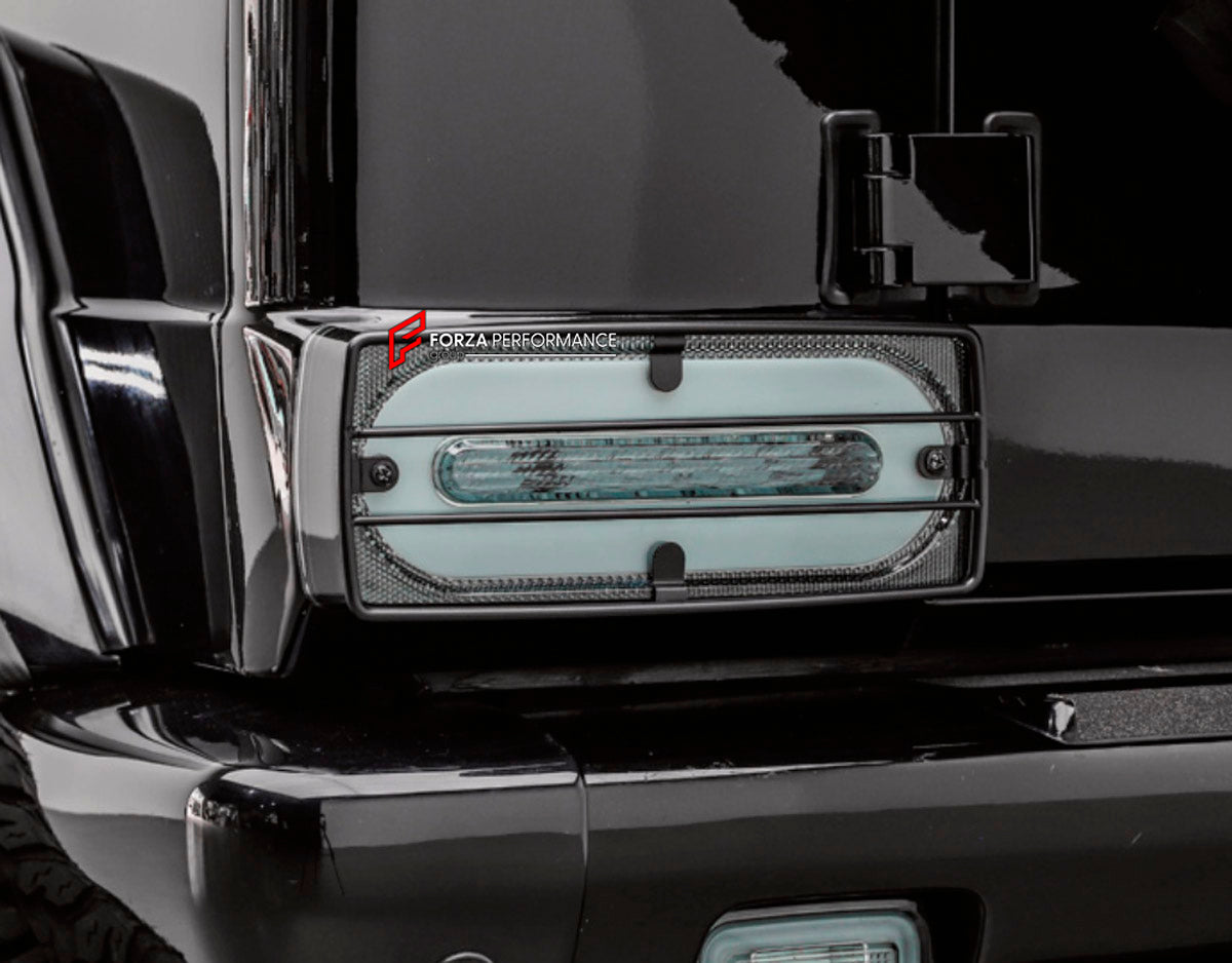 REAR LIGHT COVERS for MERCEDES-BENZ G-CLASS W463 2008 - 2018

Set includes:
Rear Light Covers

Material: Plastic

NOTE: Professional installation is required.