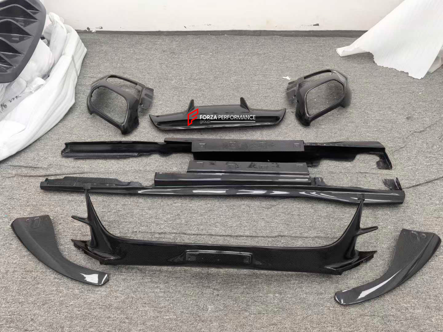 REPLACEMENT CARBON BODY KIT for FERRARI 812 SUPERFAST GTS 2017+

Set includes:

Front Splitter
Engine Bay Panels
Door Seals
Side Skirts
Rear Hood / Bonnet Lower Insert
Rear Lip
Rear Diffuser

Material: Dry Carbon

Note: Professional installation is required