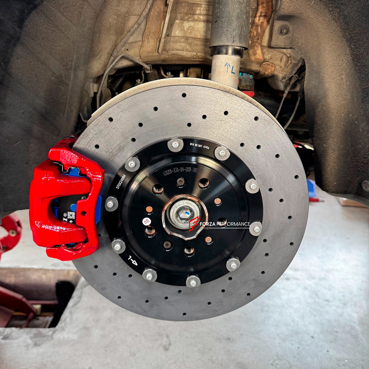 REPLACEMENT CARBON CERAMIC BRAKE DISK ROTORS for BMW M2 G87 2023+

Forza Performance Group offers various types of big brake kits, all types of aftermarket brake calipers, as well as genuine original brands of all types, such as AP Racing, Brembo, Akebono, AMG, M Performance, Audi, Porsche, Lamborghini, Toyota TRD, etc.

In the photos above you can see an installed Forza Performance Group set of carbon ceramic discs for the BMW M2 G87 with 400mm/370mm brake rotors.

Material: Carbon Ceramic

Current set inc