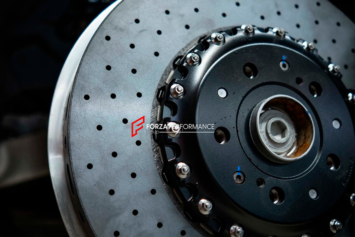 REPLACEMENT CARBON CERAMIC BRAKE DISK ROTORS for BMW M5 G90 G99 2024+

Forza Performance Group offers various types of big brake kits, all types of aftermarket brake calipers, as well as genuine original brands of all types, such as AP Racing, Brembo, Akebono, AMG, M Performance, Audi, Porsche, Lamborghini, Toyota TRD, etc.

Material: Carbon Ceramic

Current set includes:

2x 410-39mm Front Brake Discs

PLEASE INCLUDE YOUR VIN, MODEL AND YEAR WHEN PURCHASING.
