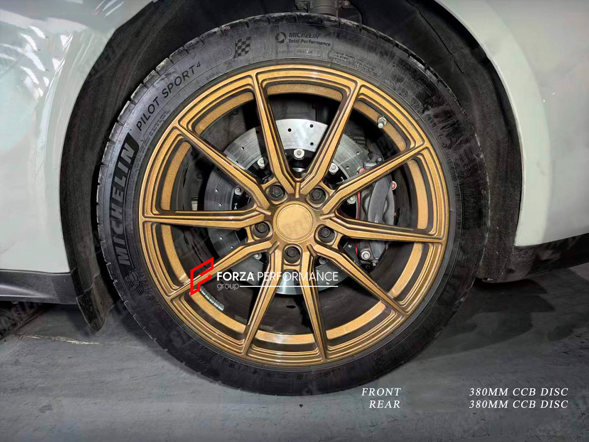 REPLACEMENT CARBON CERAMIC BRAKE DISK ROTORS for PORSCHE PANAMERA 971 2017 - 2024

Forza Performance Group offers various types of big brake kits, all types of aftermarket brake calipers, as well as genuine original brands of all types, such as AP Racing, Brembo, Akebono, AMG, M Performance, Audi, Porsche, Lamborghini, Toyota TRD, etc.

In the photos above you can see an installed Forza Performance Group set of carbon ceramic discs for the PORSCHE PANAMERA 971 2017 - 2024 with 380mm/380mm brake rotors.

Mat