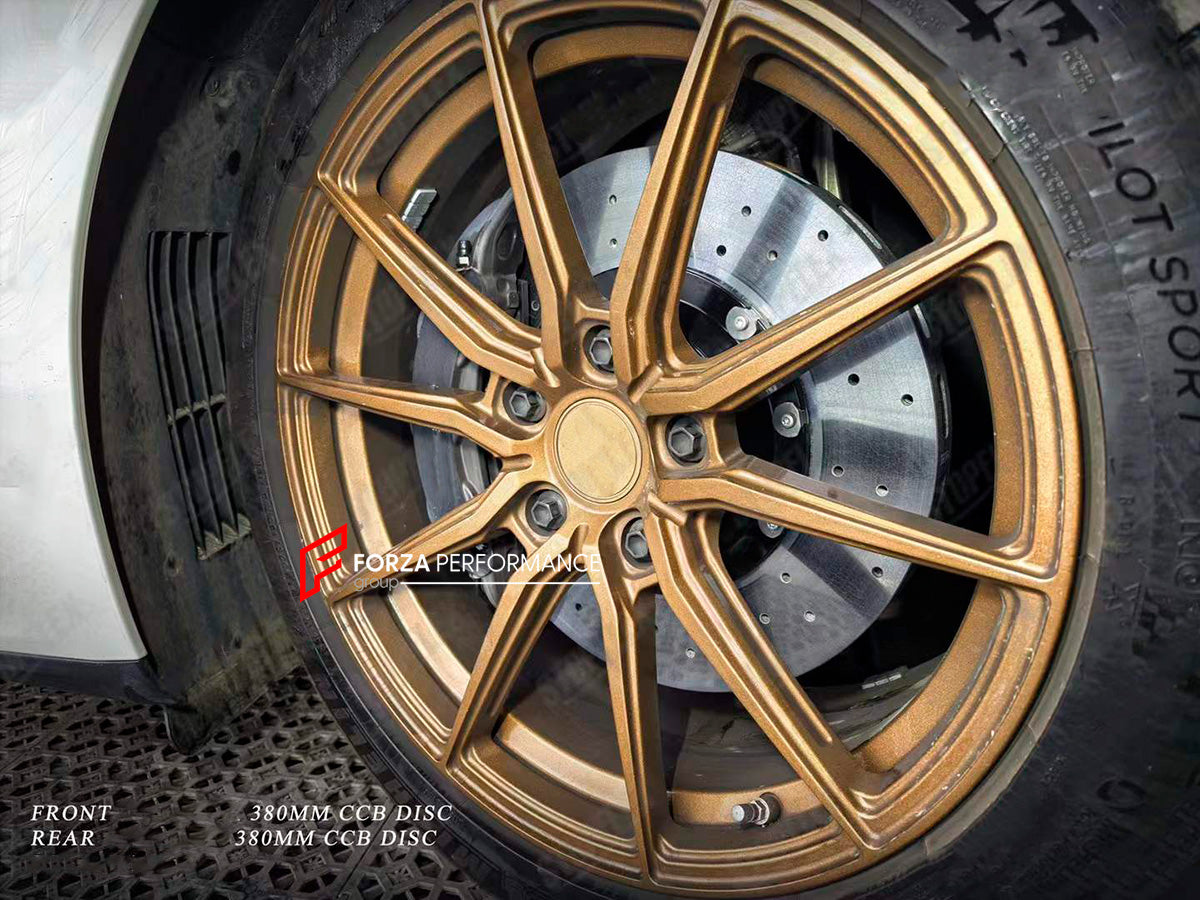 REPLACEMENT CARBON CERAMIC BRAKE DISK ROTORS for PORSCHE PANAMERA 971 2017 - 2024

Forza Performance Group offers various types of big brake kits, all types of aftermarket brake calipers, as well as genuine original brands of all types, such as AP Racing, Brembo, Akebono, AMG, M Performance, Audi, Porsche, Lamborghini, Toyota TRD, etc.

In the photos above you can see an installed Forza Performance Group set of carbon ceramic discs for the PORSCHE PANAMERA 971 2017 - 2024 with 380mm/380mm brake rotors.

Mat