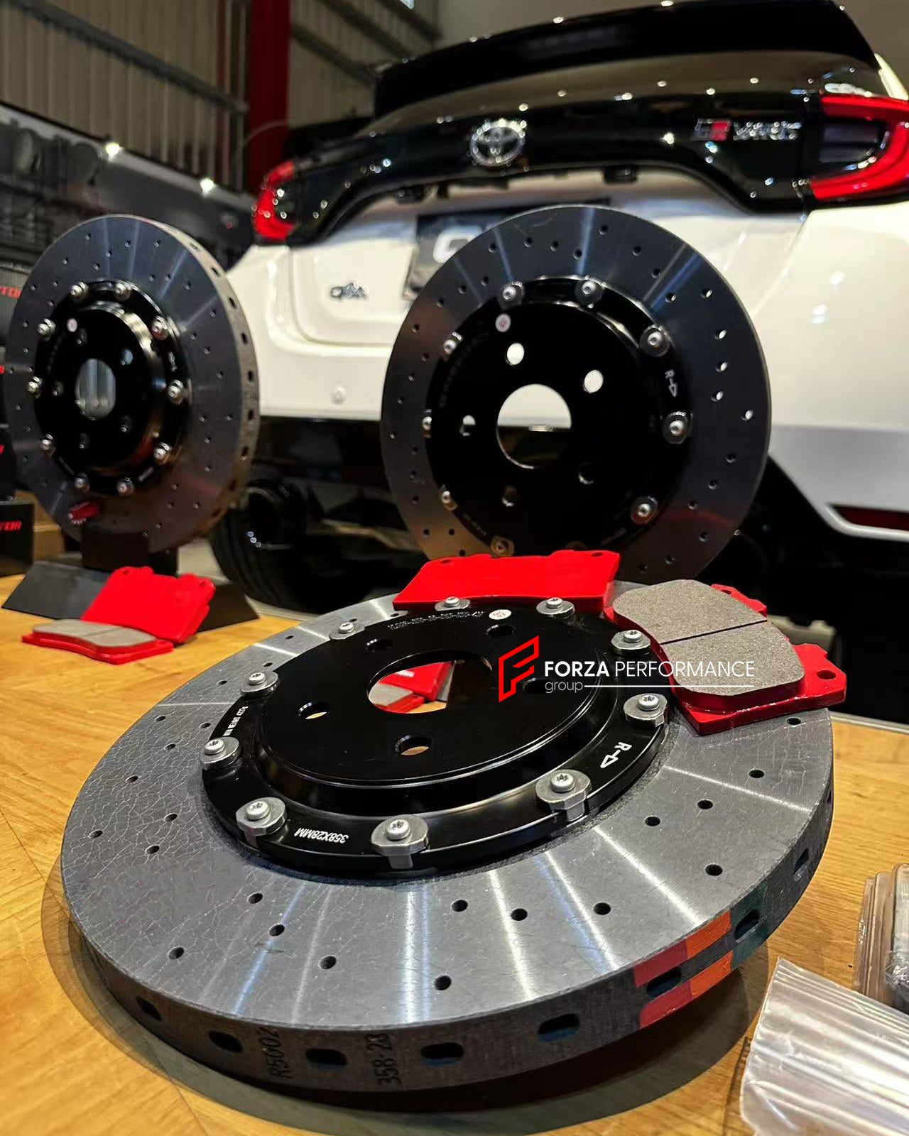 REPLACEMENT CARBON CERAMIC BRAKE DISK ROTORS for TOYOTA YARIS GR XP210 2020+

Forza Performance Group offers various types of big brake kits, all types of aftermarket brake calipers, as well as genuine original brands of all types, such as AP Racing, Brembo, Akebono, AMG, M Performance, Audi, Porsche, Lamborghini, Toyota TRD, etc.

Material: Carbon Ceramic

Current set includes:

2x Front Brake Discs 358 mm

2x Rear Brake Discs 330 mm

4x Brake Pads

PLEASE INCLUDE YOUR VIN, MODEL AND YEAR WHEN PURCHASING.