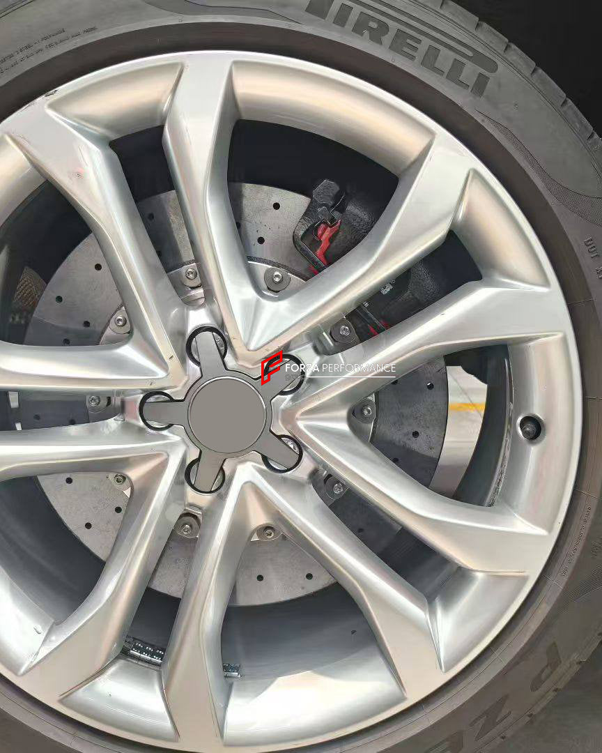REPLACEMENT CCB CARBON CERAMIC BRAKE DISK ROTORS for AUDI S8 D4 2012 - 2014

Forza Performance Group offers various types of big brake kits, all types of aftermarket brake calipers, as well as genuine original brands of all types, such as AP Racing, Brembo, Akebono, AMG, M Performance, Audi, Porsche, Lamborghini, Toyota TRD, etc.

In the photos above you can see an installed Forza Performance Group set of carbon ceramic discs for the AUDI S8 D4 2012 - 2014 with 400mm/370mm brake rotors.

Material: Carbon Ce