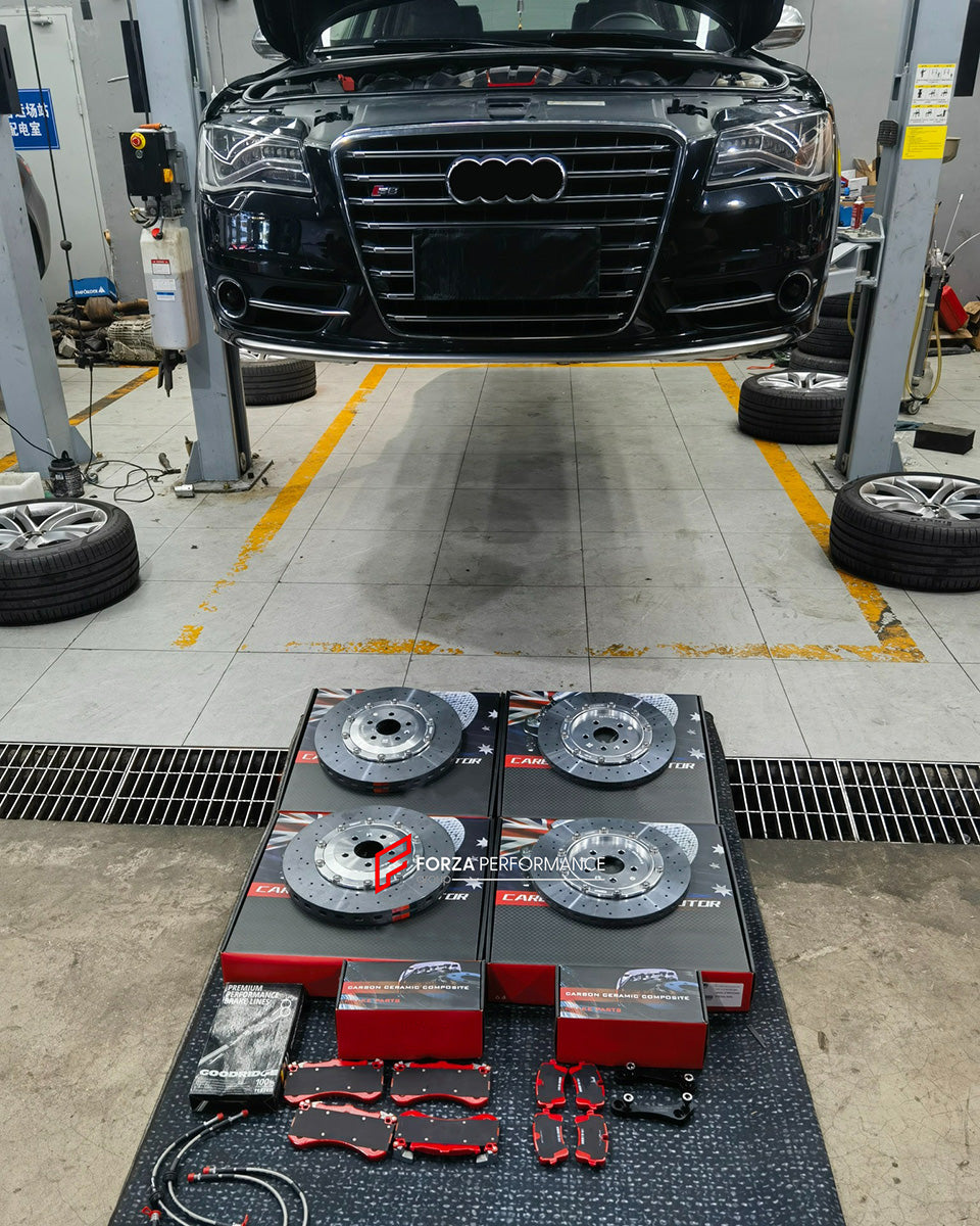 REPLACEMENT CCB CARBON CERAMIC BRAKE DISK ROTORS for AUDI S8 D4 2012 - 2014

Forza Performance Group offers various types of big brake kits, all types of aftermarket brake calipers, as well as genuine original brands of all types, such as AP Racing, Brembo, Akebono, AMG, M Performance, Audi, Porsche, Lamborghini, Toyota TRD, etc.

In the photos above you can see an installed Forza Performance Group set of carbon ceramic discs for the AUDI S8 D4 2012 - 2014 with 400mm/370mm brake rotors.

Material: Carbon Ce