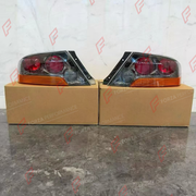 TAIL LIGHTS for MITSUBISHI LANCER EVOLUTION IX CT9A 2005 - 2007

Set includes:
Tail Lights

Material: Plastic

NOTE: Professional installation is required.