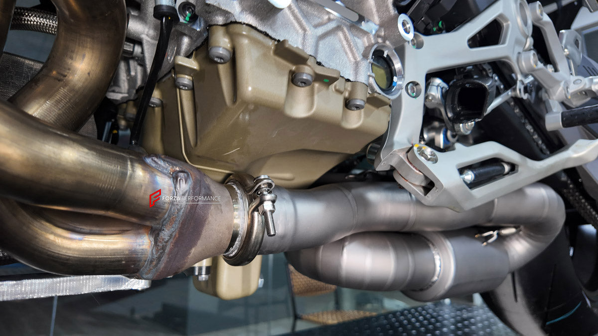 TITANIUM MOTORCYCLE EXHAUST SYSTEM for DUCATI PANIGALE V4 V4S 2025+ custom fit ARROW EXHAUST

Set include:

2-1 Merge Collectors
Mid Pipe
Resonator
Link Pipes
Exhaust Slip On
Material: Titanium (can be made in Stainless Steel)

NOTE: Professional installation is required.

FEATURES:

Engineered Digital prototyping using 3D CAD design software, each car model chassis has been 3D laser scanned in the factor
Factory run all test cars on Italian 1200HP Dyno machine, to make the best performance design of exhaus