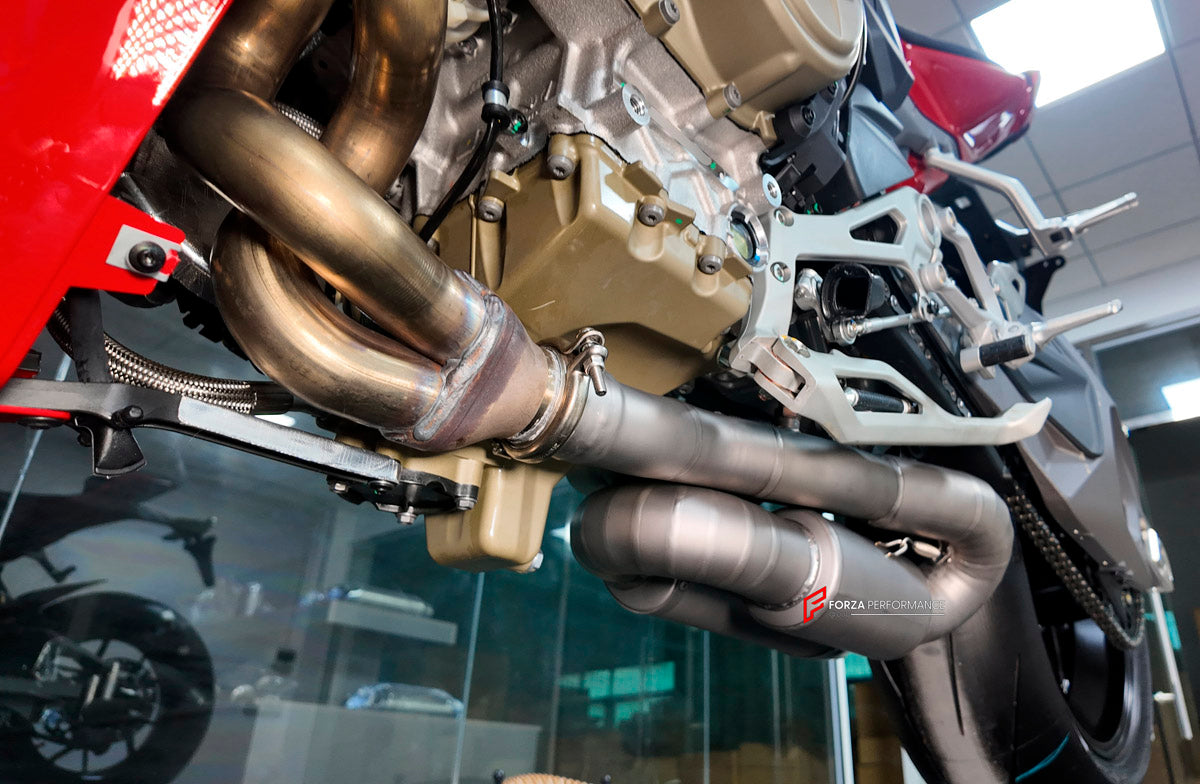 TITANIUM MOTORCYCLE EXHAUST SYSTEM for DUCATI PANIGALE V4 V4S 2025+ custom fit ARROW EXHAUST

Set include:

2-1 Merge Collectors
Mid Pipe
Resonator
Link Pipes
Exhaust Slip On
Material: Titanium (can be made in Stainless Steel)

NOTE: Professional installation is required.

FEATURES:

Engineered Digital prototyping using 3D CAD design software, each car model chassis has been 3D laser scanned in the factor
Factory run all test cars on Italian 1200HP Dyno machine, to make the best performance design of exhaus