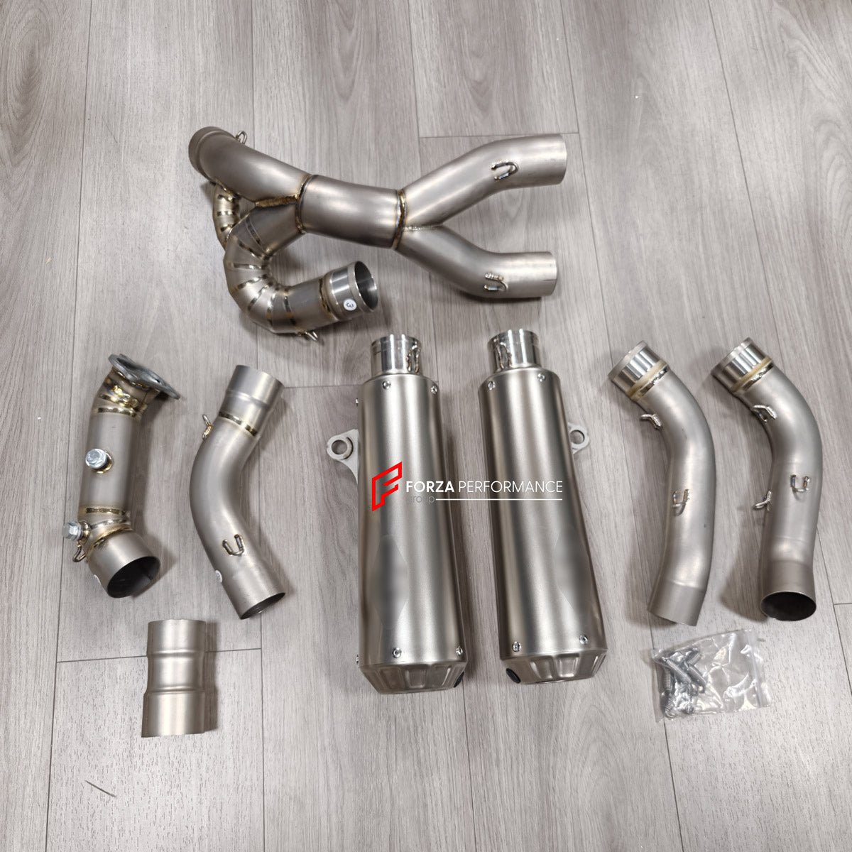 TITANIUM MOTORCYCLE HALF EXHAUST SYSTEM for DUCATI SUPERSPORT 950 950S 2021+

Set include:

Mid Pipe
Link Pipe
Exhaust Slip Ons
Bracket
Material: Titanium + Stainless Steel

NOTE: Professional installation is required.

FEATURES:

Engineered Digital prototyping using 3D CAD design software, each car model chassis has been 3D laser scanned in the factor
Factory run all test cars on Italian 1200HP Dyno machine, to make the best performance design of exhaust
CNC bending machine accurately bends the tube accord