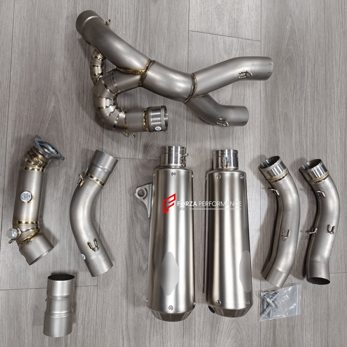 TITANIUM MOTORCYCLE HALF EXHAUST SYSTEM for DUCATI SUPERSPORT 950 950S 2021+

Set include:

Mid Pipe
Link Pipe
Exhaust Slip Ons
Bracket
Material: Titanium + Stainless Steel

NOTE: Professional installation is required.

FEATURES:

Engineered Digital prototyping using 3D CAD design software, each car model chassis has been 3D laser scanned in the factor
Factory run all test cars on Italian 1200HP Dyno machine, to make the best performance design of exhaust
CNC bending machine accurately bends the tube accord