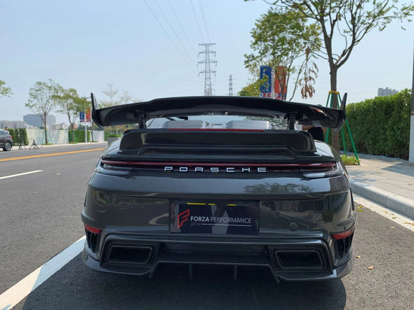 TOPCAR STYLE DRY CARBON REAR BUMPER FOR PORSCHE 992 2018+ Set include: Rear Bumper Rear Diffuser Exhaust Tips Material: Dry Carbon Fiber