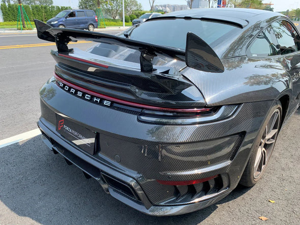 TOPCAR STYLE DRY CARBON REAR BUMPER FOR PORSCHE 992 2018+ Set include: Rear Bumper Rear Diffuser Exhaust Tips Material: Dry Carbon Fiber