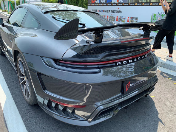 TOPCAR STYLE DRY CARBON REAR BUMPER FOR PORSCHE 992 2018+ Set include: Rear Bumper Rear Diffuser Exhaust Tips Material: Dry Carbon Fiber