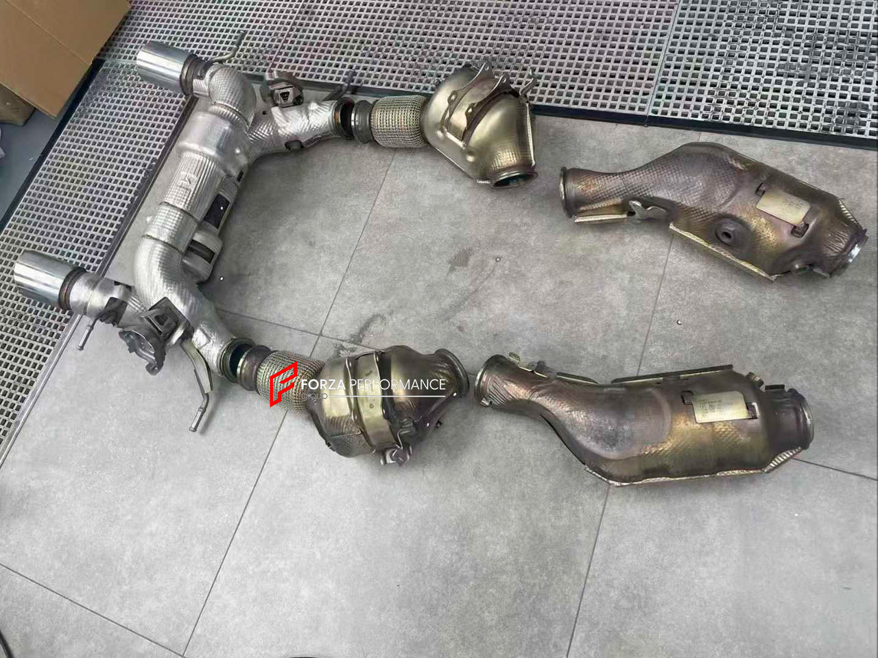 Forza Performance Aggressive sporty sound VALVED EXHAUST CATBACK MUFFLER for MASERATI MC20 2020+ 3.0T

Valved exhaust, meaning that has remote, controlled valves - allowing a switch between an aggressive loud sports sound and a sound that is closer to the OEM sound

Set includes:

Catbacks
Center Pipes
Exhaust Tips
Mufflers with valves

Factory exhaust tips must be reused

Material: Stainless steel ( for an extra cost we can make titanium )

Optional: We can offer downpipe and catless downpipe

Production t