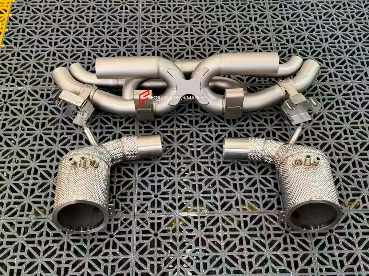 VALVED EXHAUST CATBACK MUFFLER for PORSCHE 911 992.2 CARRERA S 2025+ 3.0L

Set includes:

Catback without muffler
Catless downpipes
Valves
Valve control box with remote control (you may also reuse your factory exhaust valve motors)

Material: Stainless steel

Production time: 10 working days

More options available for additional EXTRA cost (not included in this listing price. Please contact for pricing):

DOWNPIPES with HEAT PROTECTION
Can make that catback in Titanium material

NOTE: Professional installa