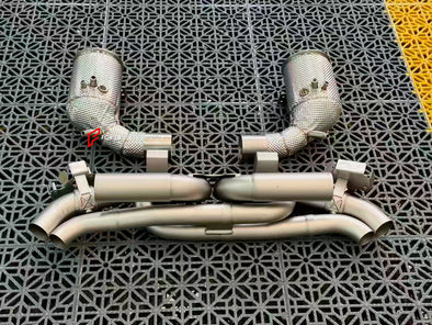 VALVED EXHAUST CATBACK MUFFLER for PORSCHE 911 992.2 CARRERA S 2025+ 3.0L

Set includes:

Catback without muffler
Catless downpipes
Valves
Valve control box with remote control (you may also reuse your factory exhaust valve motors)

Material: Stainless steel

Production time: 10 working days

More options available for additional EXTRA cost (not included in this listing price. Please contact for pricing):

DOWNPIPES with HEAT PROTECTION
Can make that catback in Titanium material

NOTE: Professional installa