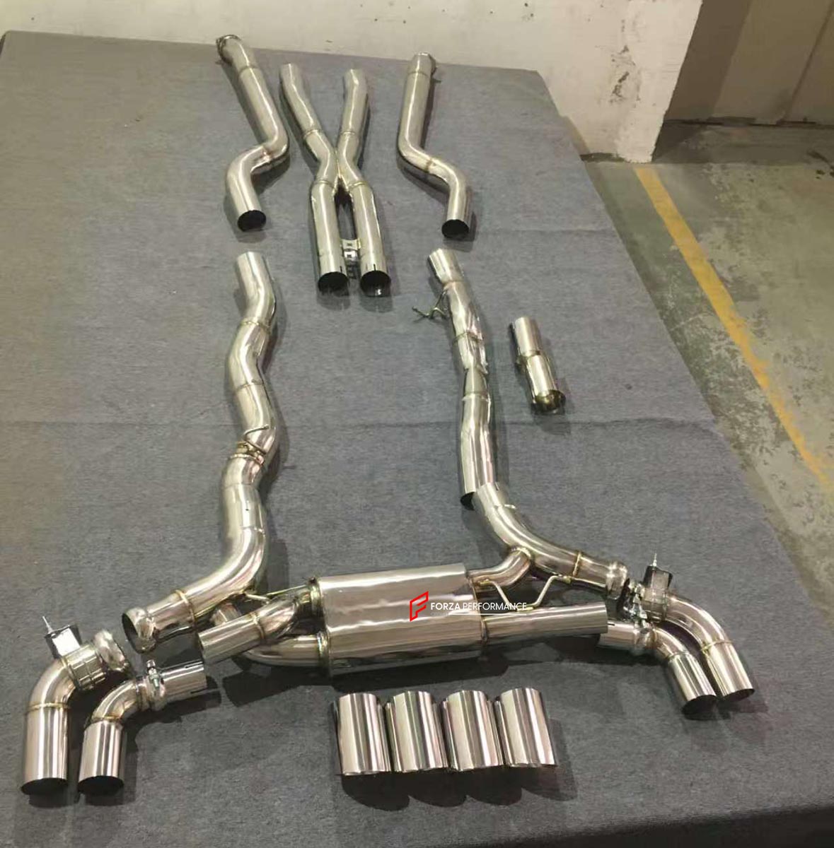 VALVED EXHAUST CATBACK MUFFLER WITH MIDDLE X PIPE for BMW M5 G90 S68 4.4T 2025 + FORZA PERFORMANCE Custom Fit

Set includes:

Middle X Pipe
Center Pipes
Valved Bypass Mufflers
Quad Exhaust Tips
Electronic Valve Actuators
Valve Control Box with Remote Control (you may also reuse your factory exhaust valve motors)
Material: Stainless Steel (Can be made of Titanium)

Production time: 10-15 days

